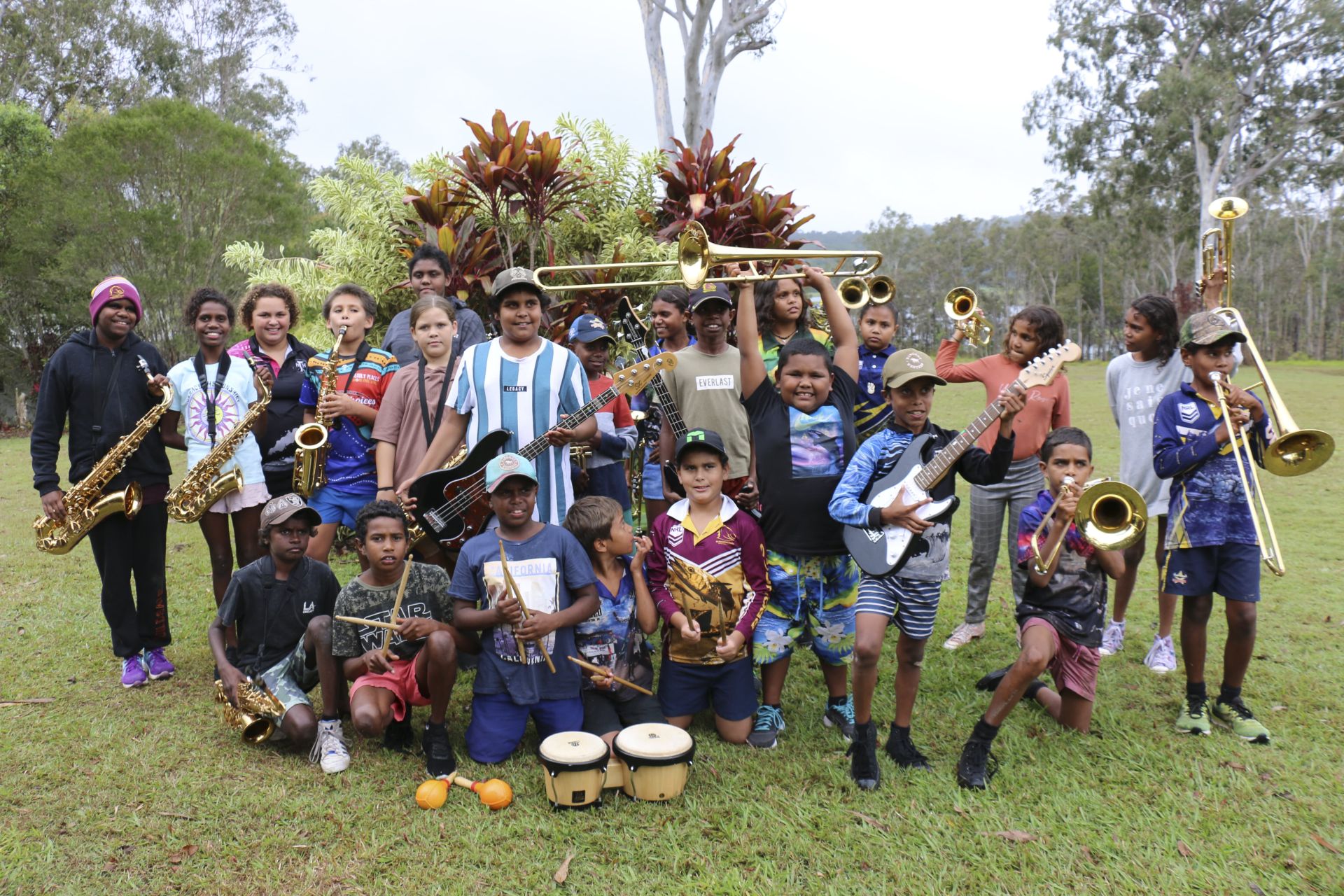 A group of teenagers with their instruments during music class as part of the Australian Curriculum.